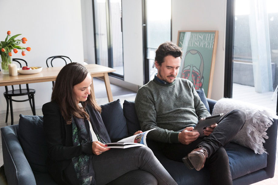 couple sat on a sofa